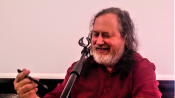 Foto de Richard Stallman en una intervención en Génova en 2017